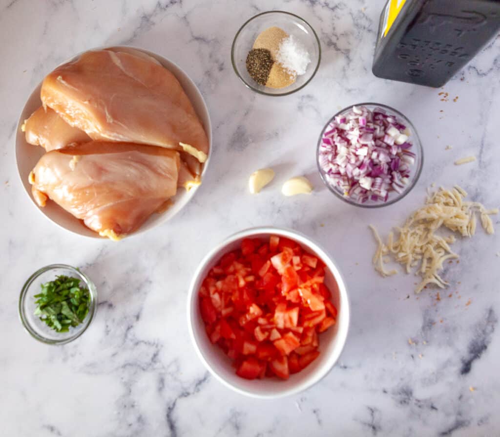 Ingredients for bruschetta chicken laid out