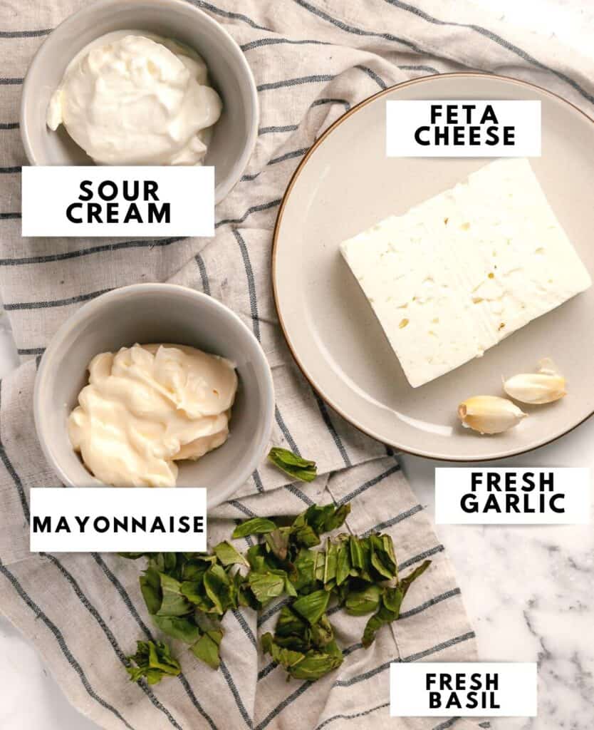 Ingredients for the feta dip, labelled and laid out.