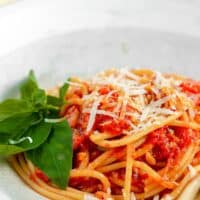 Homemade arrabiatta sauce served on spaghetti.