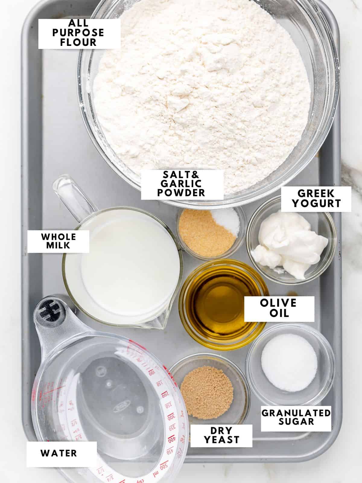 Ingredients for tawa naan labelled on a sheet tray