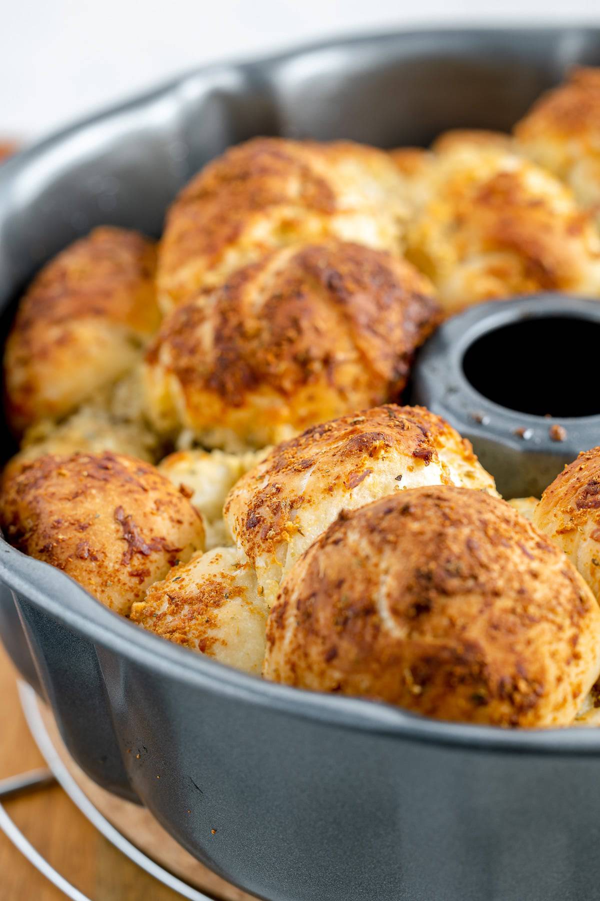 Monkey bread in a bundt pan out of the oven. 