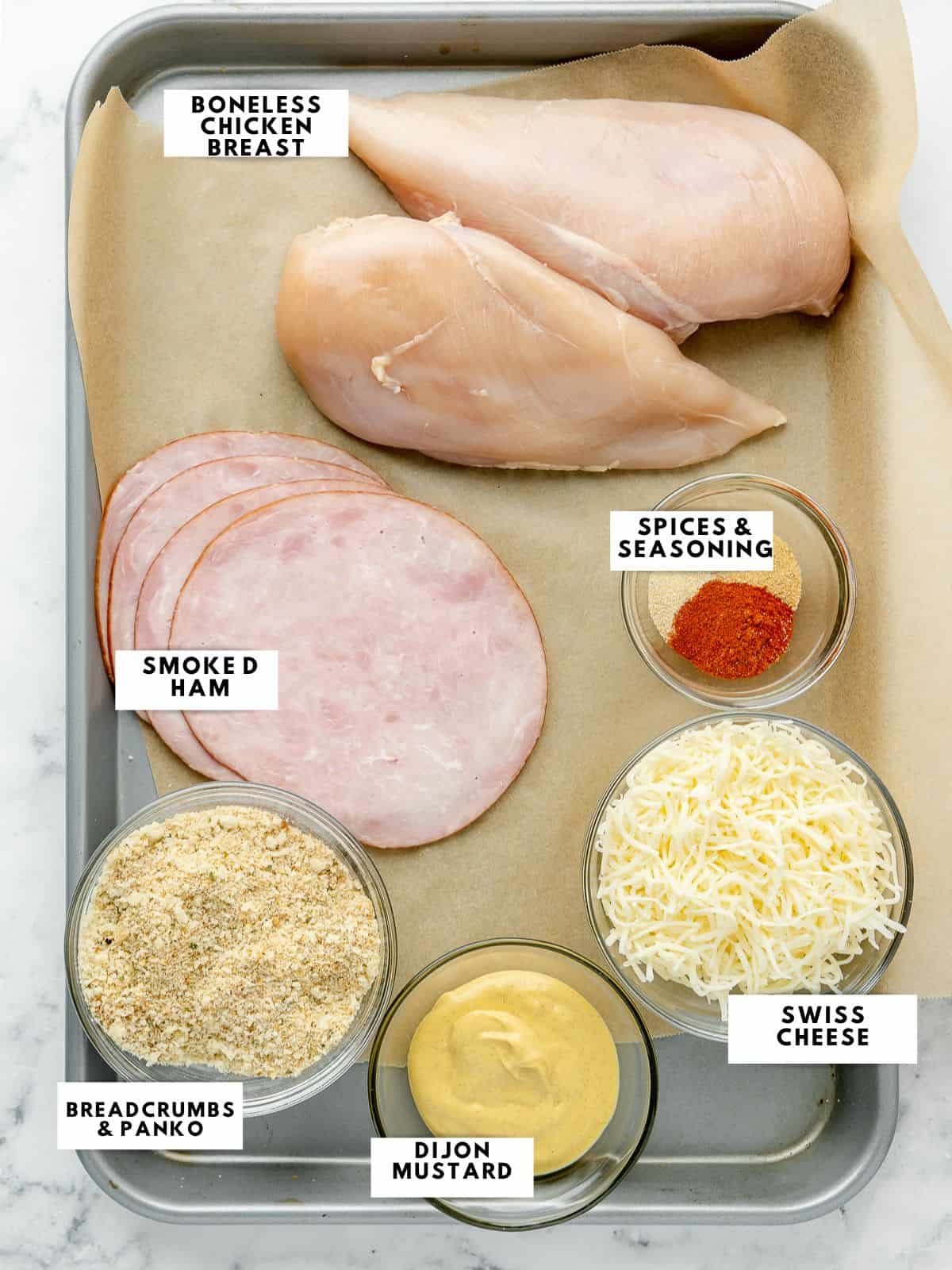 Ingredients for cordon bleu labelled on a sheet tray.