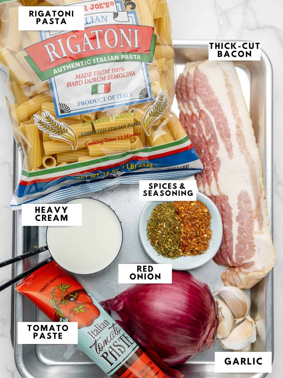 Recipe ingredients, labelled on a sheet tray.
